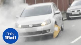 Crazy moment man tries to drive car with clamped wheel  it does not end well [upl. by Annahsar]