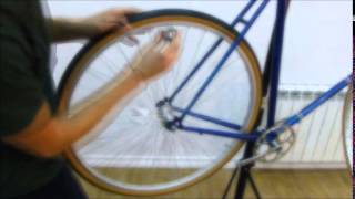 How to dish a gear wheel for a single speed use using a spoke key [upl. by Laurette]