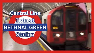 A London Underground Central line train arriving and departing from Bethnal Green Station [upl. by Yeltihw782]