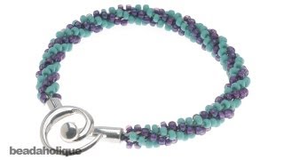 How to Braid Beaded Kumihimo and Make a Bracelet [upl. by Nalani615]