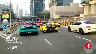 Supercars selfishly hogging Nicoll Highway for a video shoot please fine the production company [upl. by Leyes]