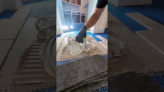 Troweling Schluter Allset thinset over Blanke Permat underlayment for a stone tile installation [upl. by Menendez]