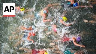 Triathlon kicks off on Day 5 at Paris Olympics  AP Top Photos [upl. by Crow499]