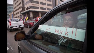 Vehicle protests at Michigan Capitol over Gov Whitmer stay home order [upl. by Renferd]