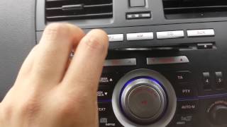 HOW TO INSERT DISCCD MAZDA 3 6 DISC STEREOCD PLAYER [upl. by Yentruoc]