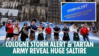 Cologne storm alert closes fan zones amp Tartan Army reveal huge Saltire outside cathedral [upl. by Ifill]