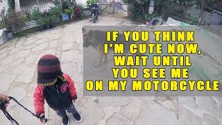 23 months old starts riding a motorcycle  Kid revs bike and gets scared [upl. by Wynny]