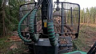 John Deere 1010G Loading spruce pulpwood [upl. by Syah]