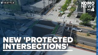 Seattle debuts protected intersection to boost pedestrian cyclist safety [upl. by Lieno896]