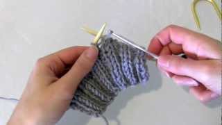 Knitting How to fix a dropped stitch using a crochet hook [upl. by Akiemehs]