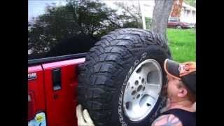 INSTALL AND REVIEW RUGGED RIDGE JEEP HEAVY DUTY TIRE CARRIER [upl. by Eiramait]