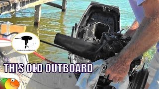 1989 Evinrude Tracker 25 hp  Exhaust Gasket Leak Repair [upl. by Yentnuoc235]