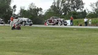 Duesenberg race Maroon roadster vs a gray phaeton [upl. by Arimihc]