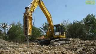 Excavator Komatsu PC210LC Hydraulic Breaker Breaking Rocks [upl. by Froma]