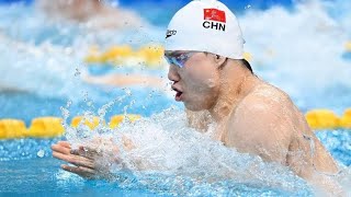 Chinas Qin Haiyang sets new 100m breaststroke Asian record at national championships [upl. by Anaehr]