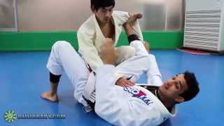 Spider Guard Scissor Sweep to Triangle with Romulo Barral BJJLIBRARYCOM [upl. by Eelirrem]