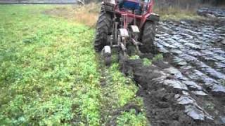 Massey Ferguson 135 Part 4 Ploughing wmv [upl. by Elbam]