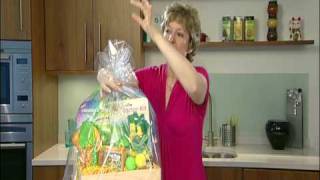 Wrapping a hamper in a cellophane bag [upl. by Nerrual]