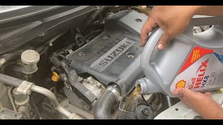 Swift Dzire Engine oil oil filter change and Oil Drain Plug cleaning [upl. by Annavaj519]