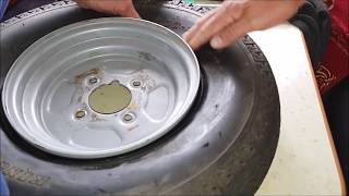 HOW TO FIT A INNER TUBE INTO A TUBELESS TRAILER TYRE BY HAND [upl. by Nafri]