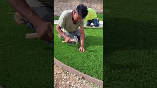 Laying and Nailing Artificial Grass  How to Install Artificial Turf [upl. by Weiner245]