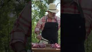 Andrew Zimmern Prepares Pork Shoulder cooking [upl. by Donahue]