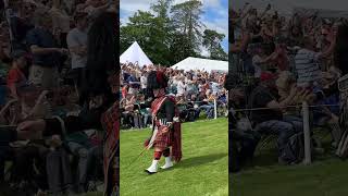 Massed Pipes and Drums salute the Chieftain during 2023 Dufftown Highland Games in Scotland shorts [upl. by Luane]