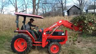 Hauling brush with Kubota L3010 tractor [upl. by Anelrahc]