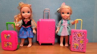 Luggage shopping  Elsa amp Anna toddlers are packing suitcase bags [upl. by Marchak]