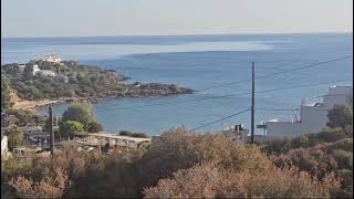 Seaview building plot next to sandy beach Agios Nikolaos Crete [upl. by Cartan]