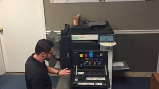 How to change toner on a KM Bizhub C353 [upl. by Balfore]