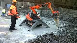 Robotic Demolition Machine Demolishing Concrete Slab  Dishmaancom [upl. by Etnovert]