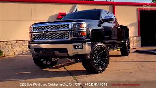 2014 Silverado with McGAUGHYS 7quot Lift kit 22x12 wheels and 35x1250R22 MT tires [upl. by Persian24]