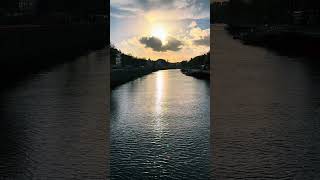 Evening sunlight over the River Liffey sunset dublin city ireland [upl. by Nossila]