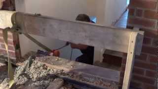 Moving A Quarter Ton Lintel Down Stairs [upl. by Revert]