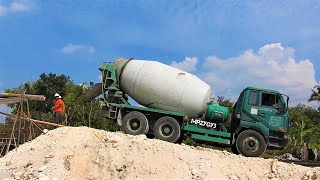 Excavator Ready Mix Cement Trucks Working On The Bridge Foundation Construction [upl. by Yanahc]