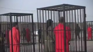 ISIS releases video of Peshmerga fighters in cages [upl. by Earaj]