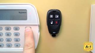 A1 Security Alarms Inc DSC How to use 4 Button Keyfob [upl. by Solahcin168]