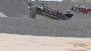 Video Automated Anti segregation Radial Stacker Stockpiling Large Gravel In Layers [upl. by Driskill204]