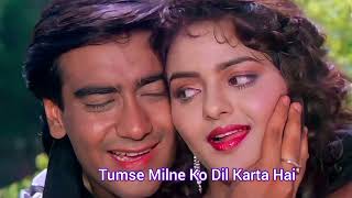 Tumse Milne Ko Dil Karta Hai Lyrics Song  Ajay Devgan  Madhoo  Alka Y  Kumar S  Hindi Song [upl. by Ashraf]