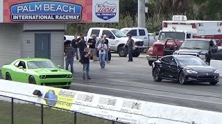 Tesla Model S P85D Sets 14 Mile World Record While Challenger Hellcat Goes up in Smoke Drag Racing [upl. by Melquist]