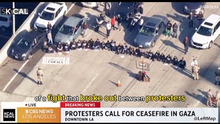 LA Freeway Shutdown 75 Arrested for Ceasefire Protest [upl. by Ycrad184]