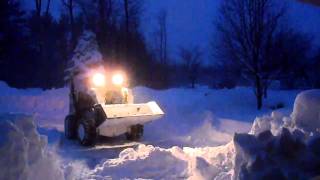 Bobcat A300 Moving Snow Drift [upl. by Laehpar506]