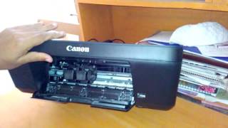 How to replacechangeopen ink cartridge from canon pixma E400 printer [upl. by Ver576]