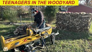 Firewood with Our Christmas Tree Farm Crew ReSplitting and Stacking larger splits [upl. by Nylzzaj]