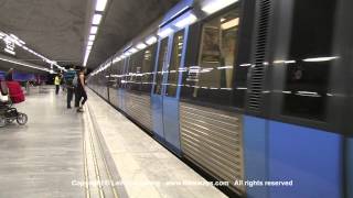 SL Tunnelbana tåg  Metro trains at Bagarmossen station Stockholm Sweden [upl. by Wilone]