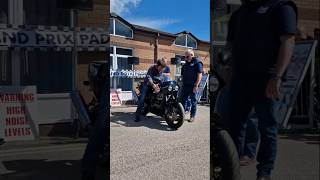 Celebrity bike test British TV presenter Guy Martin tests a bike in the grand Prix paddock in uk [upl. by Bail]