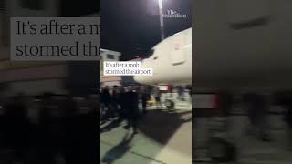 Passengers hustled back inside plane from Tel Aviv as mob storms Dagestan airport [upl. by Seira]