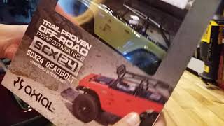 Axial SCX24 DEADBOLT UNBOXING Mini Crawler 124 Scale Electric 4WD  Unboxing and Initial SetUP [upl. by Nnaacissej]