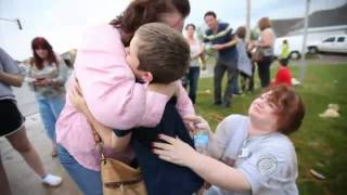 Poignant images capture tornados emotional aftermath [upl. by Bolan937]